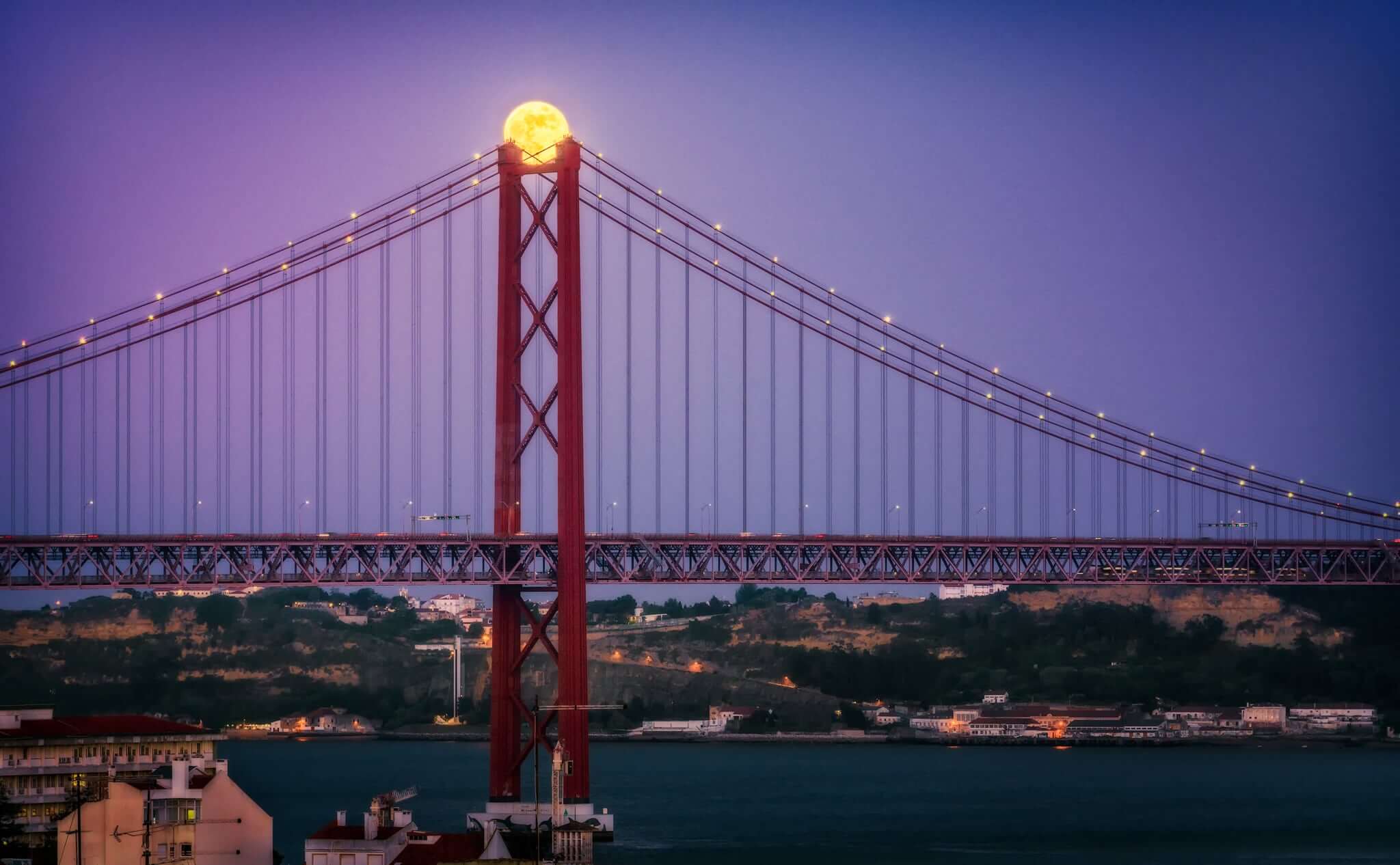Super moon over Lisbon Portugal by Nico Trinkhaus