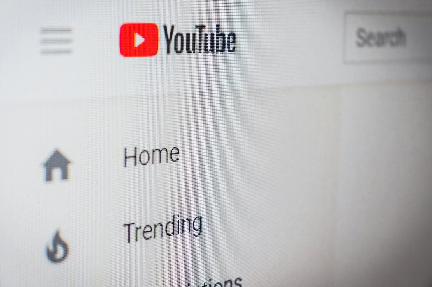 YouTube home screen with menu