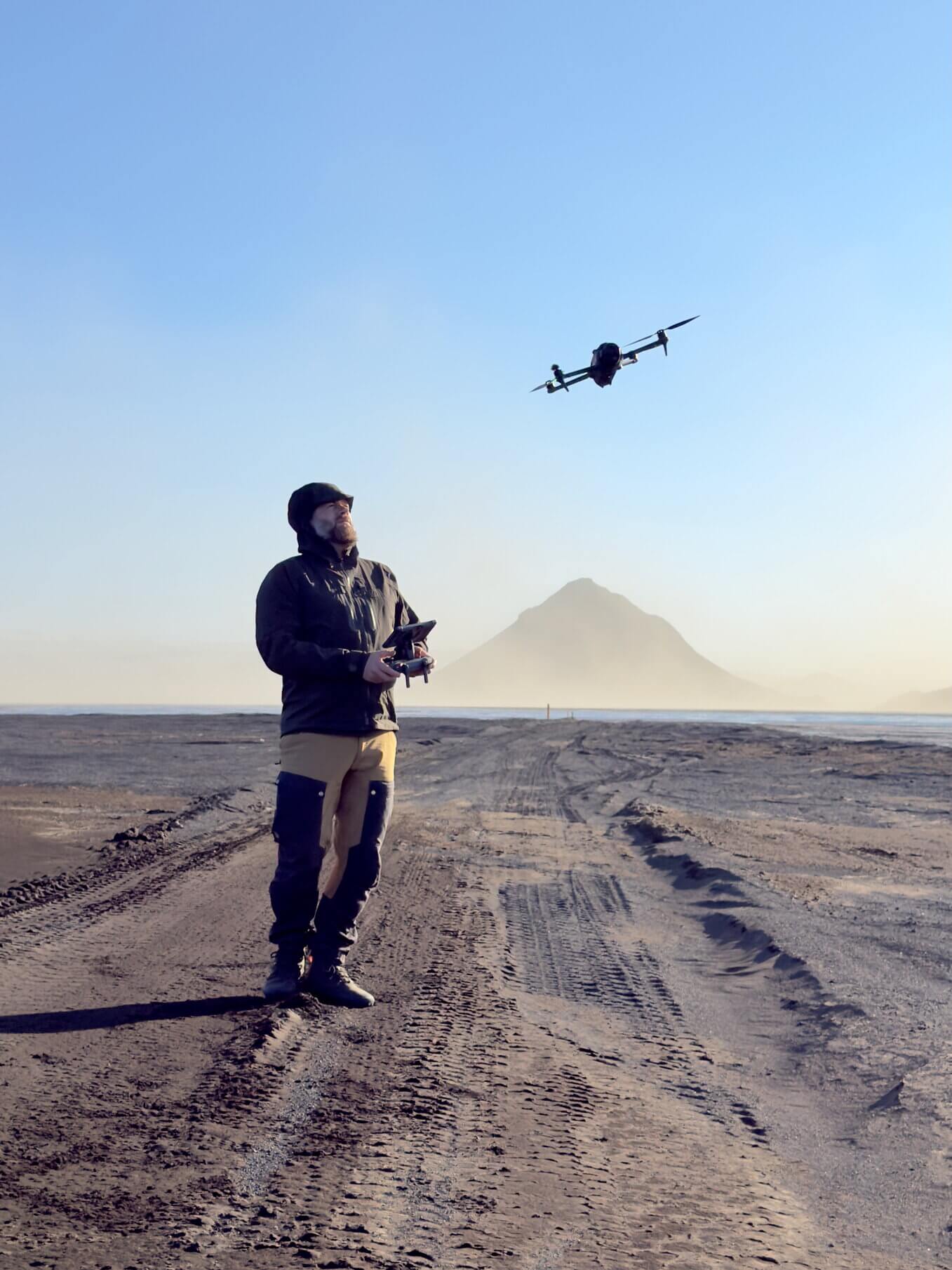 Portrait of photographer Jeroen Van Nieuwenhove handling a drone
