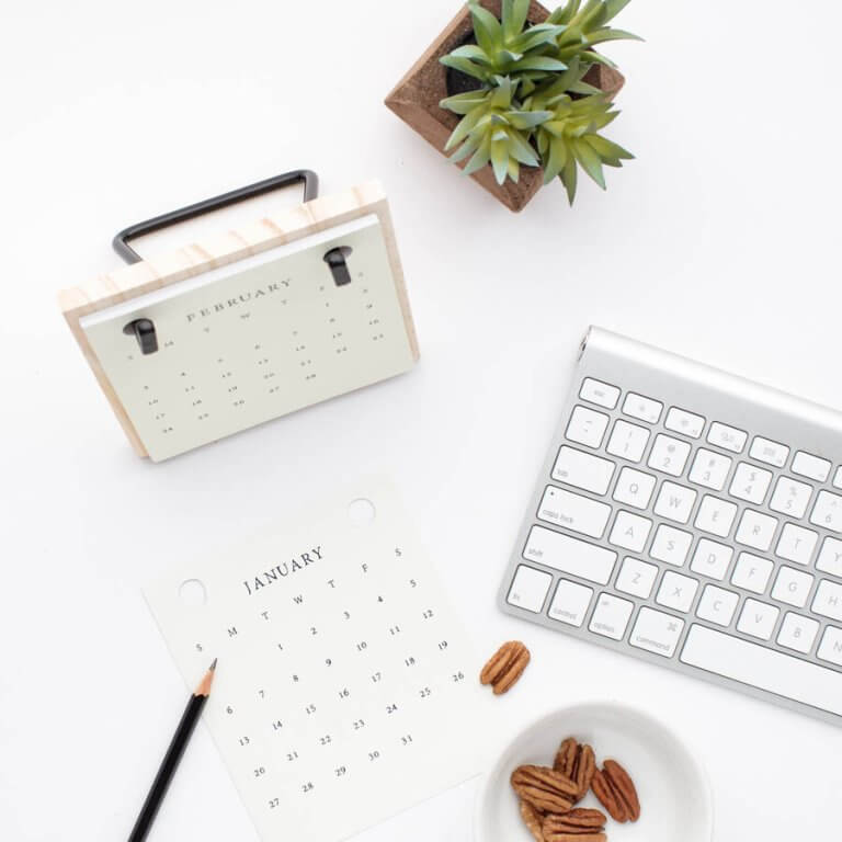 January calendar and keyboard on a white desktop